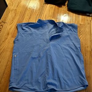 7 sets of women’s Figs Scrubs all size medium.